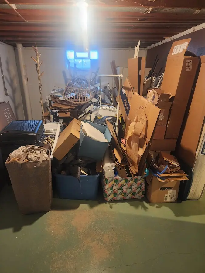 Roll-off dumpster container at job site for 6 Yard Dumpster Rental in Conneaut